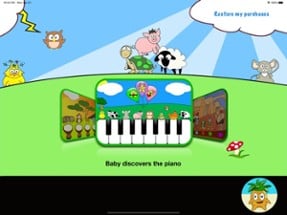 Baby discovers the piano Image